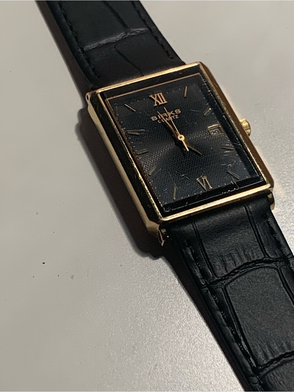 Classic Rectangular Gold-Tone Black Dial Wristwatch